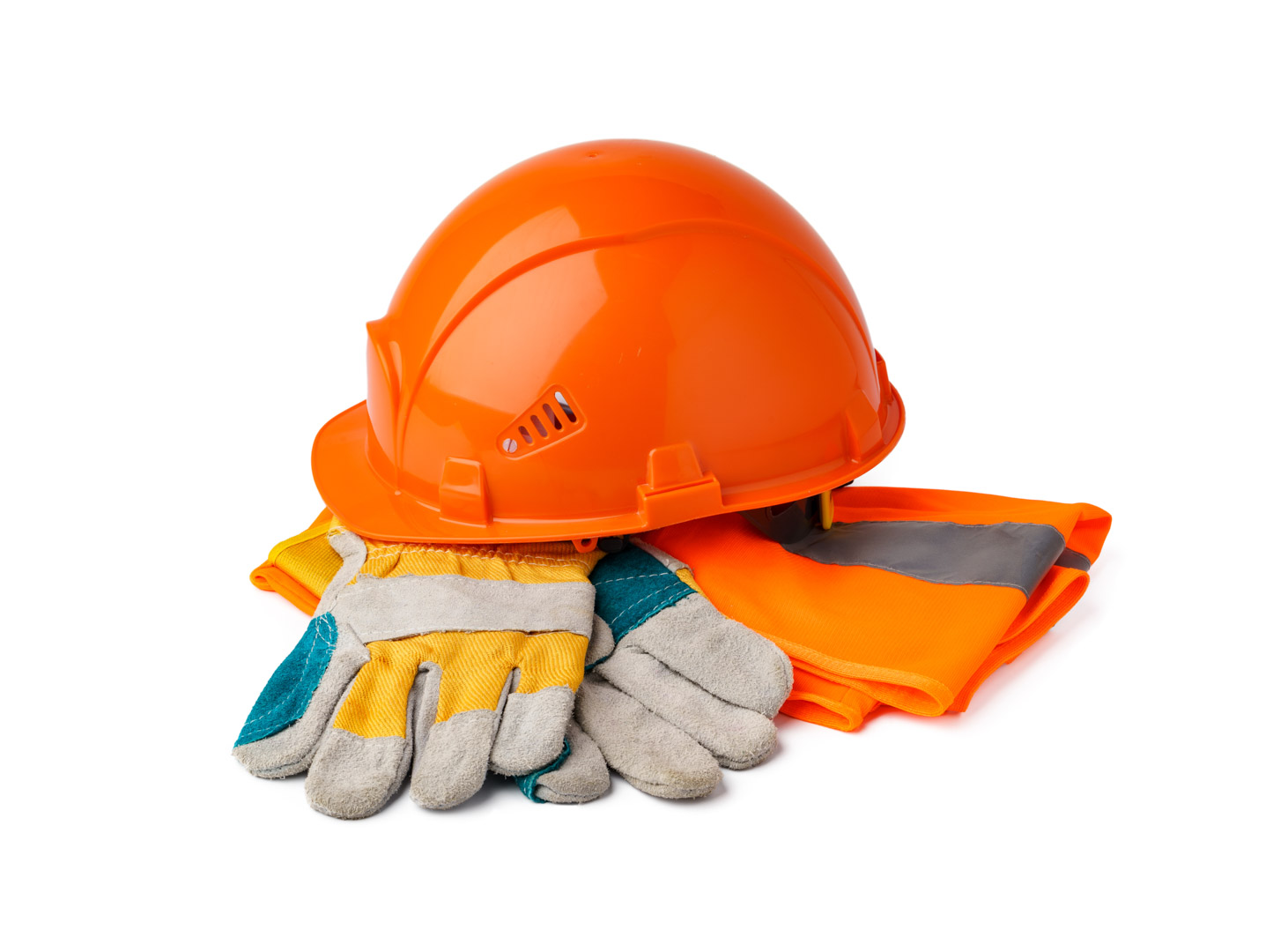 Safety hardhat and work gloves isolated on white background, close up